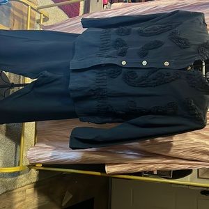 Black produce company jacket and pant.